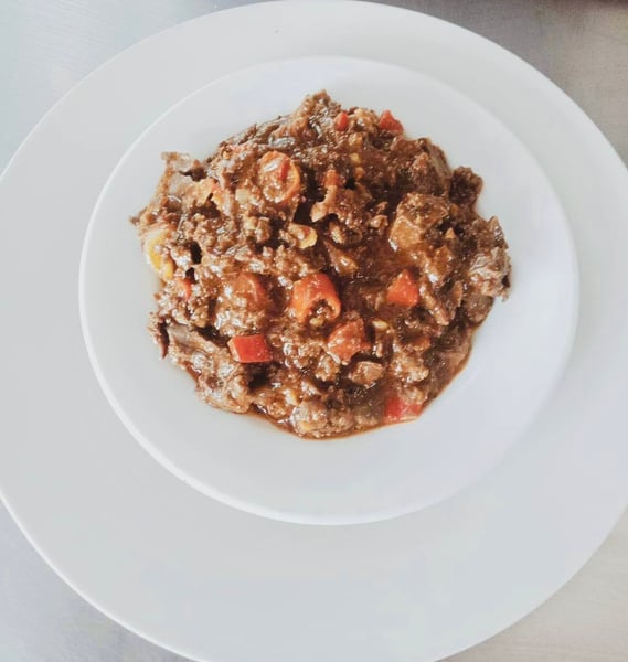 Image of Pork Bopis includes rice and drink with free delivery.