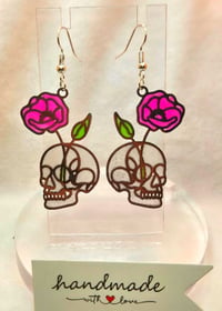 Image 1 of Handcrafted Resin Glow In The Dark Skull and Rose Earrings 