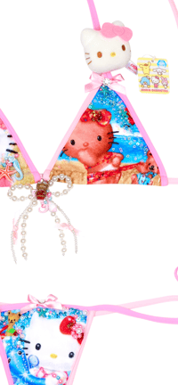 Image 7 of tanned hellokitty in the beach ball game