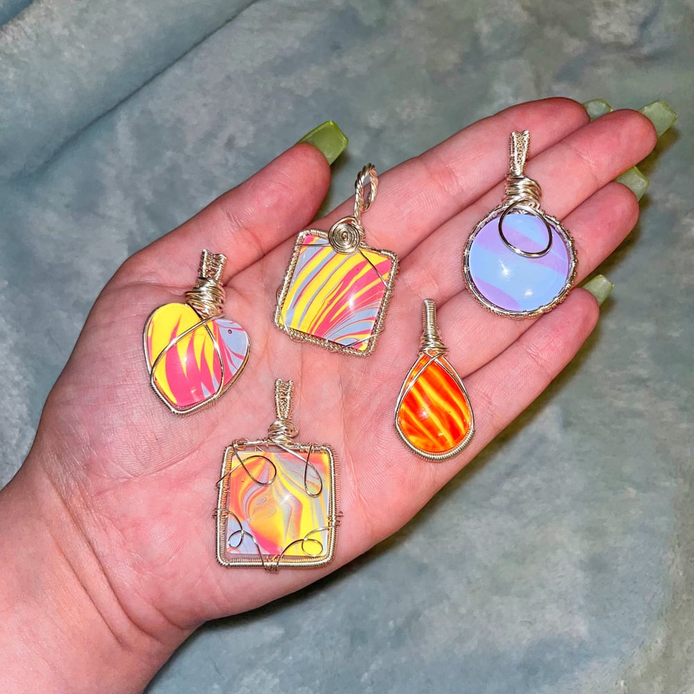 Image of collab pendants