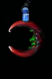 Image 3 of Uv reactive ruby Cresent moon pendant 🌜 