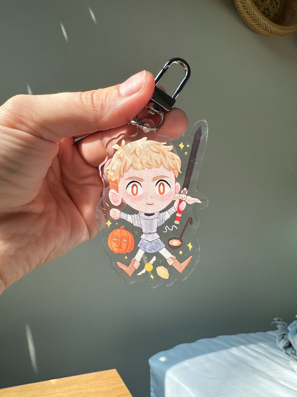 Image of Dungeon Meshi Laios Double Sided Acrylic Keychain 2.5”