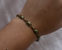 Image 3 of string of hearts bracelet 