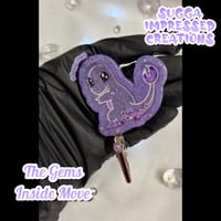 Image 1 of Purple Charmander Shaker Clip