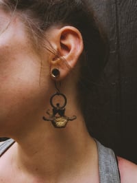 Image 2 of vertebra dangles