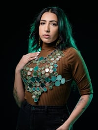 Image 1 of DAYIRA top (green,brown and white peralescent)