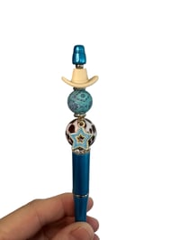 Image 3 of Cowboy Hat On Blue Pen