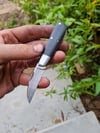 mini wharncliffe, damascus blade. 