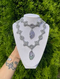 Image 1 of stolen wing necklace