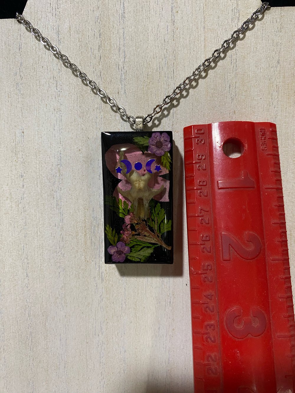 Floral skull pendant 