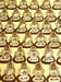 Image of Tiny Tan and Gold Buddhas