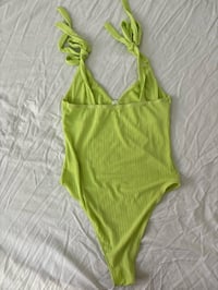 Image 3 of Green bodysuit // 38