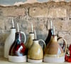 Dimpled Olive Oil Bottles assorted glasses