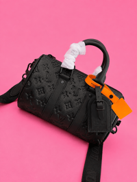 Black embossed speedy 20