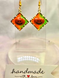 Image 2 of Handcrafted Resin Glow In The Dark Pumpkin Earrings 