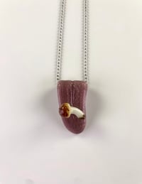 Image 1 of Glow n the dark mushi tongue pendant 