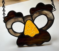 Image 1 of Stained glass window disguise suncatcher 