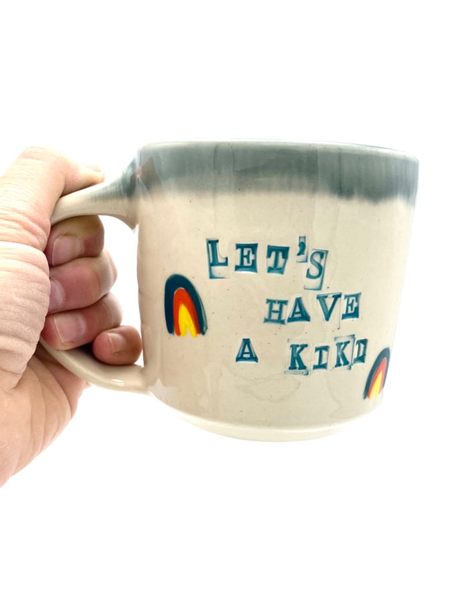 Let’s Have a Kiki Mugs