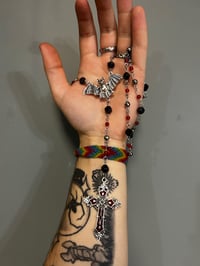 Image 3 of red and black bat rosary