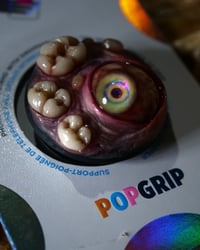 Image 2 of Teratoma, Glow bright eye, Swappable Phone Grip/Socket for smartphones