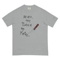 Image 10 of never try to catch the knife