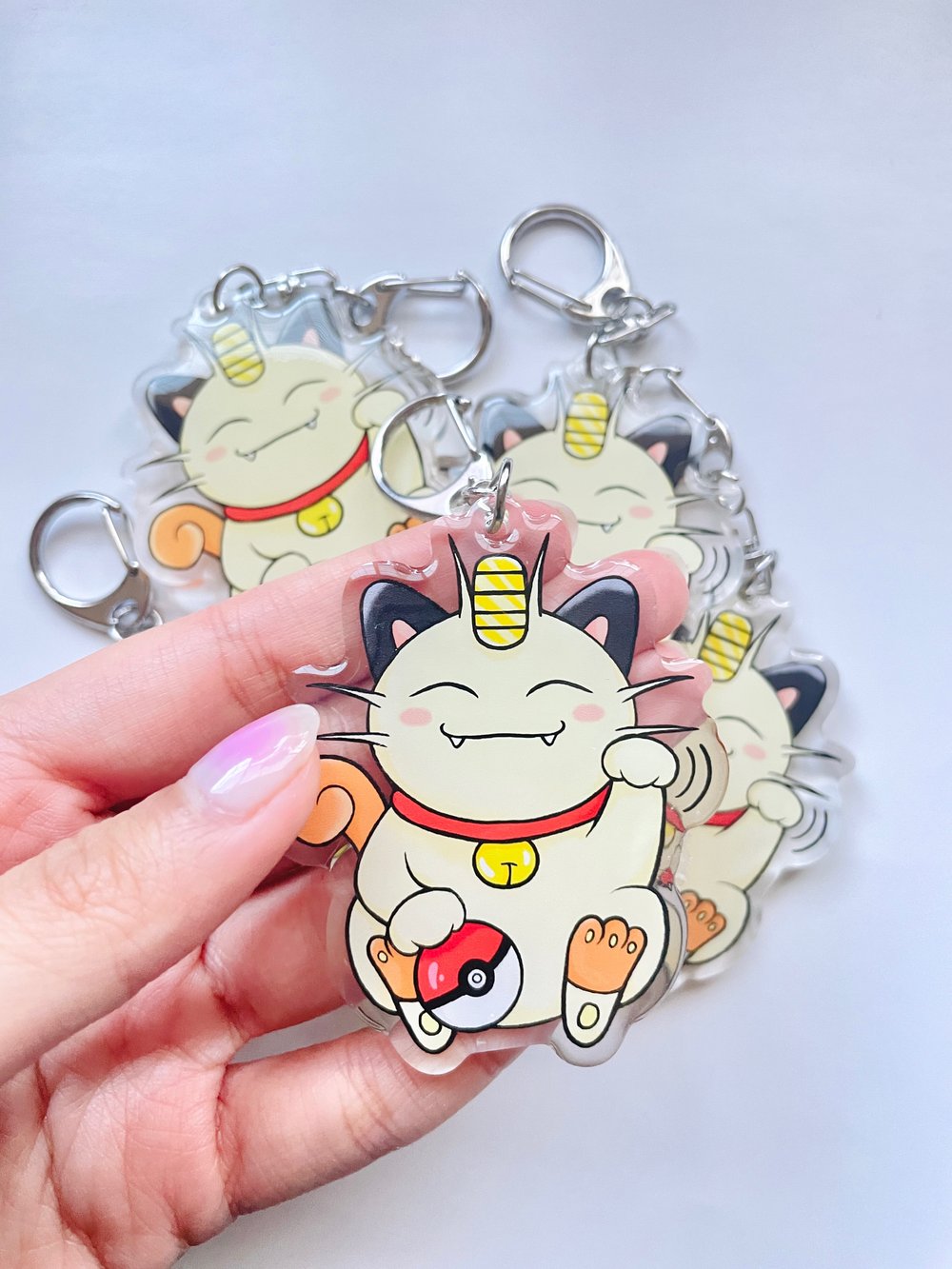 Image of Meowth Acrylic Keychain