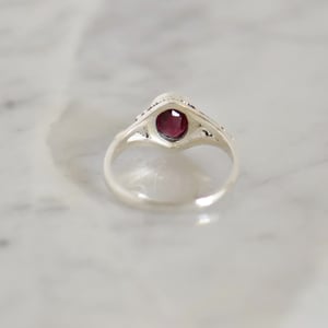 Image of Red Garnet oval cut vintage style silver ring