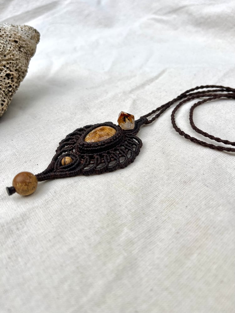 Image of Macrame necklace with fossil coral