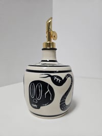 Image 1 of Oil Bottle 10 - Snakes, skulls & bones