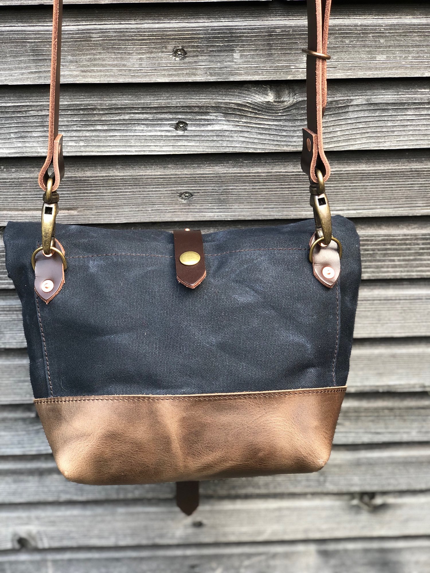 Image of Satchel in black waxed canvas with leather base