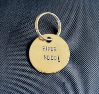 Image 4 of WHITE LOTUS keychains! 