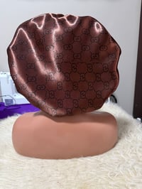 Image 1 of Brown GG