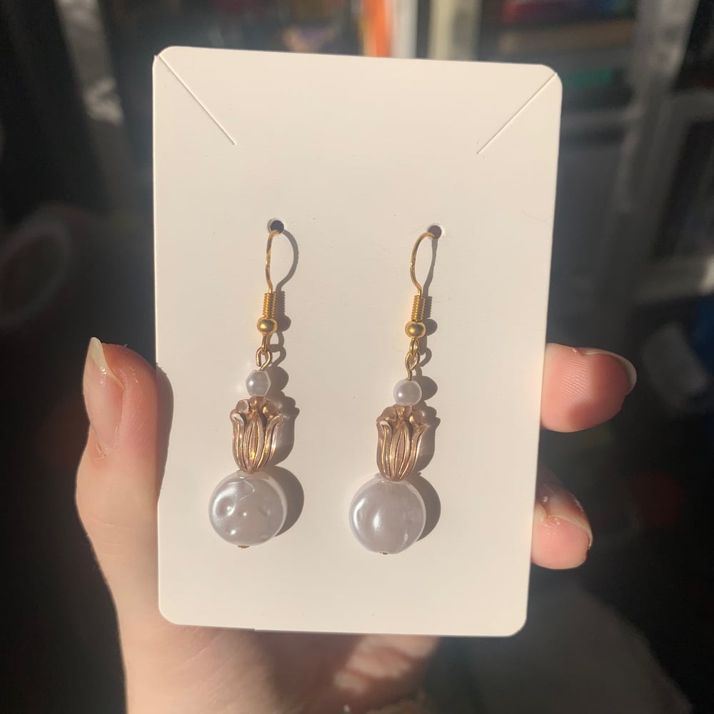 Image of moon pink bead earrings