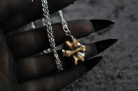 Image 1 of dead good tea stained bone pendant 