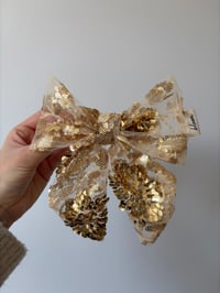 Image 1 of Gold hairbow