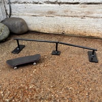 Image 1 of Across and Down Rail