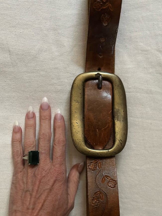 late 60s/early 1970s tooled leather belt with massive brass buckle