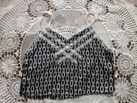 Image 1 of chain with crossed lace