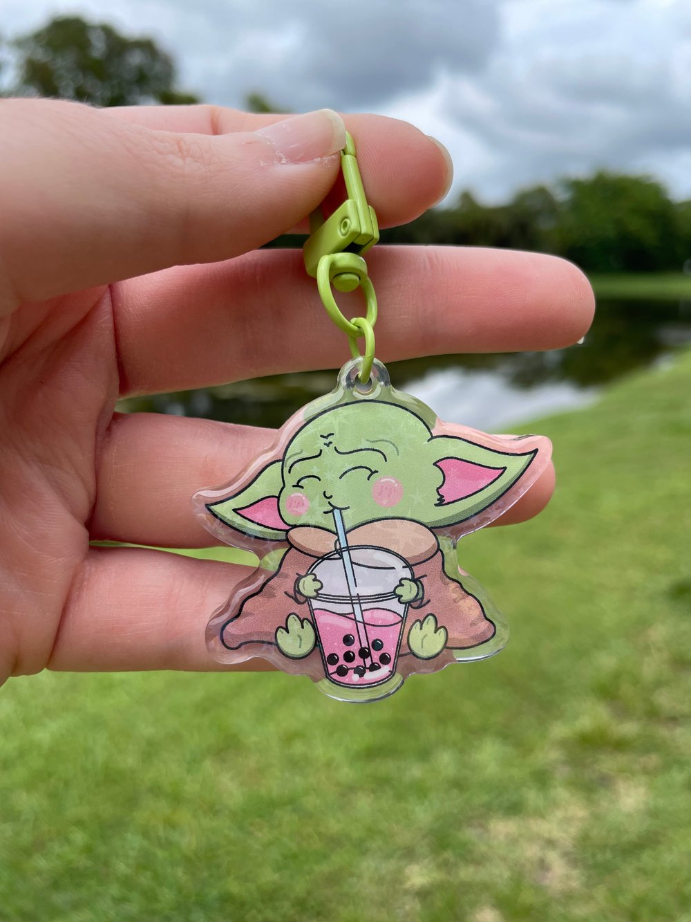 Image of Baby Alien Drinking Boba Plush Pillow & Acrylic Keychain