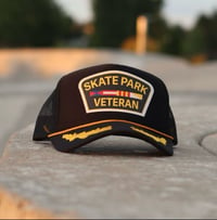 Image 1 of Skatepark Veteran Trucker Hat (Gold Leaves)