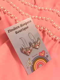 Pink winged hearts 