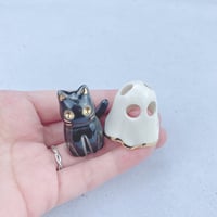 Image 4 of glow in dark Black kitten with ghost mask ceramic figurine