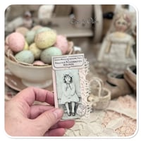 Image 9 of A Petite snippet sample french lace book in a tiny tin.