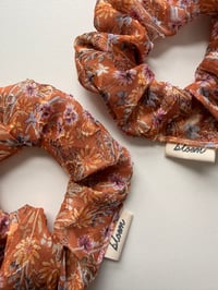 Image 1 of Terracotta floral scrunchie