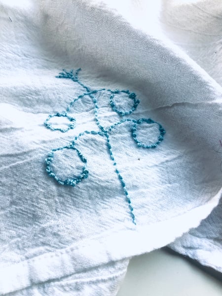Image of botanical bleu hand embroidered towel