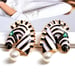 Image of Green Eyed Zebra Earrings