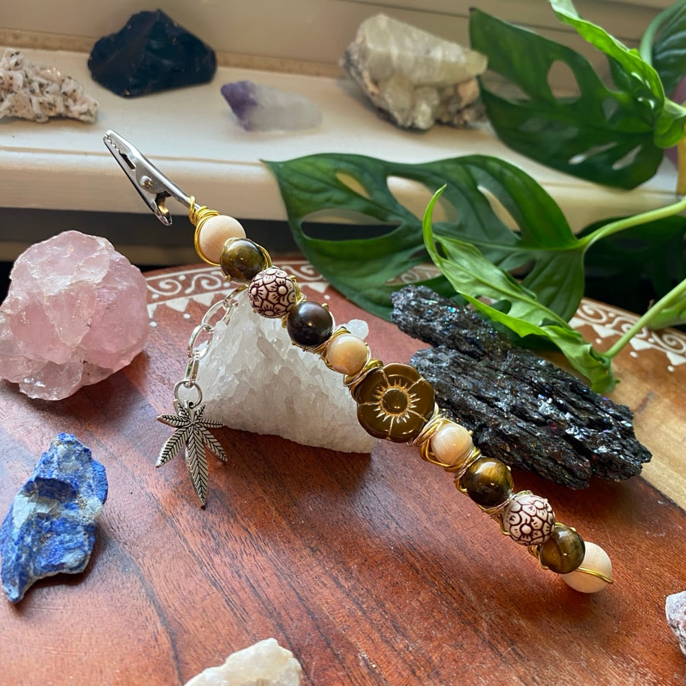 Image of floral latte roach clip 