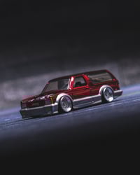 Image 1 of RED RLC GMC TYPHOON 
