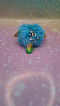 Image 2 of Yellow and blue Fluffennutter keychain 