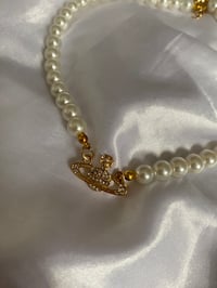 Image 1 of Gold orb pearl necklace